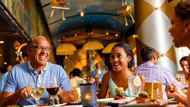 A family dining at Flying Fish Cafe on Disney's BoardWalk in Florida