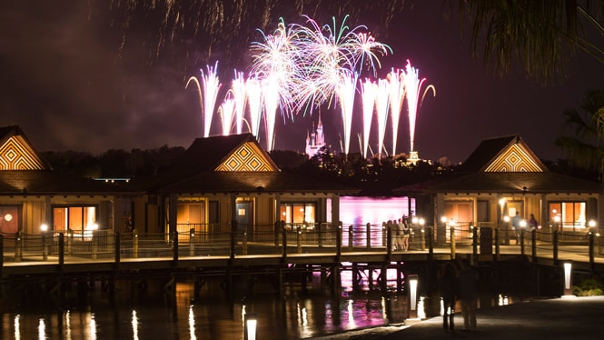 People watching the Magic Kingdom fireworks from the decks of overwater Bungalows